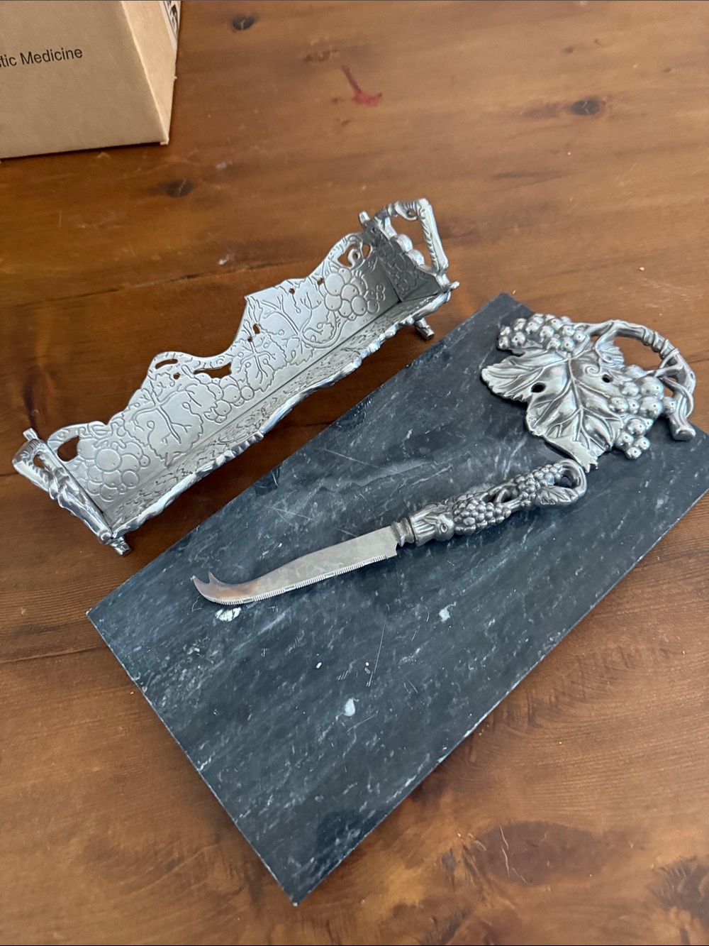 Stone cheeseboard with cracker tray and cheese knife